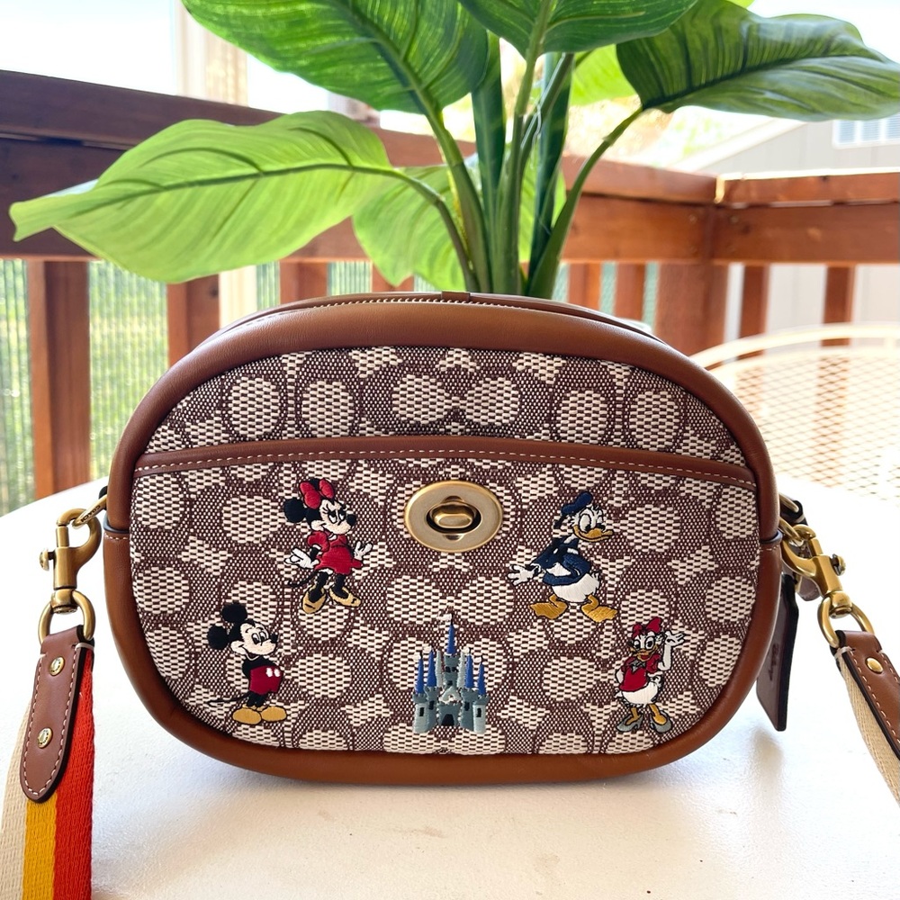 Like new Disney x Coach camera bag signature textile jacquard
Mickey Mouse